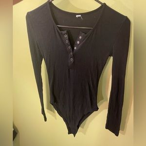 Black long sleeved body suit